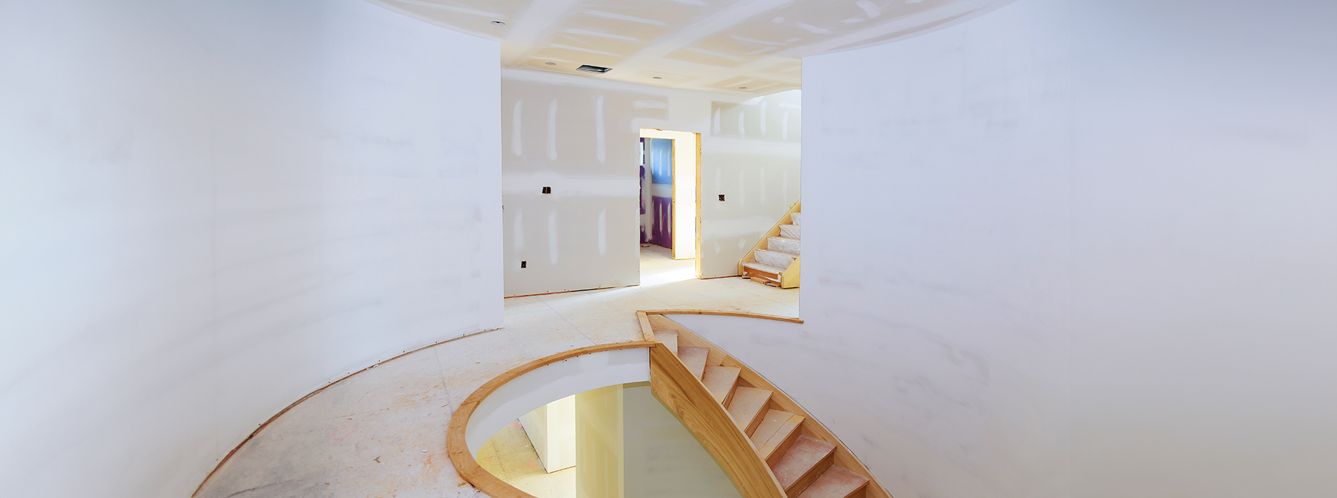 San Marcos Drywall Repair drywall installation in curved stairwell